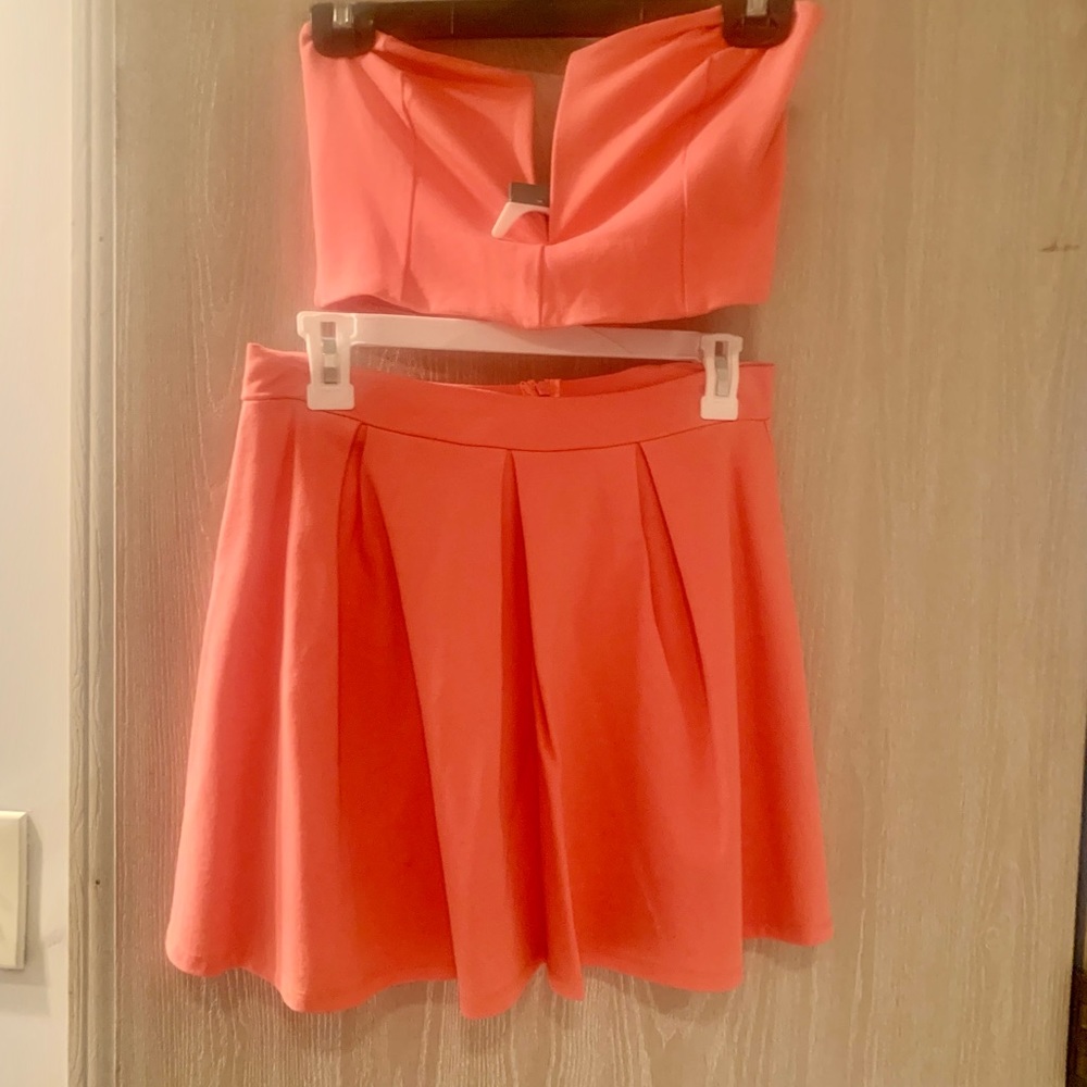 Pink/coral two piece strapless top and skirt - Size L stretch material
